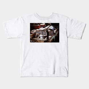 Vintage vise on the wooden table Kids T-Shirt